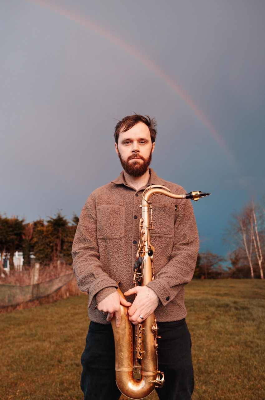 tom-in-front-of-a-bush